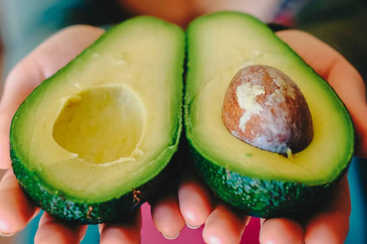 Eating for beauty - Laura's Idea - avocado in hands